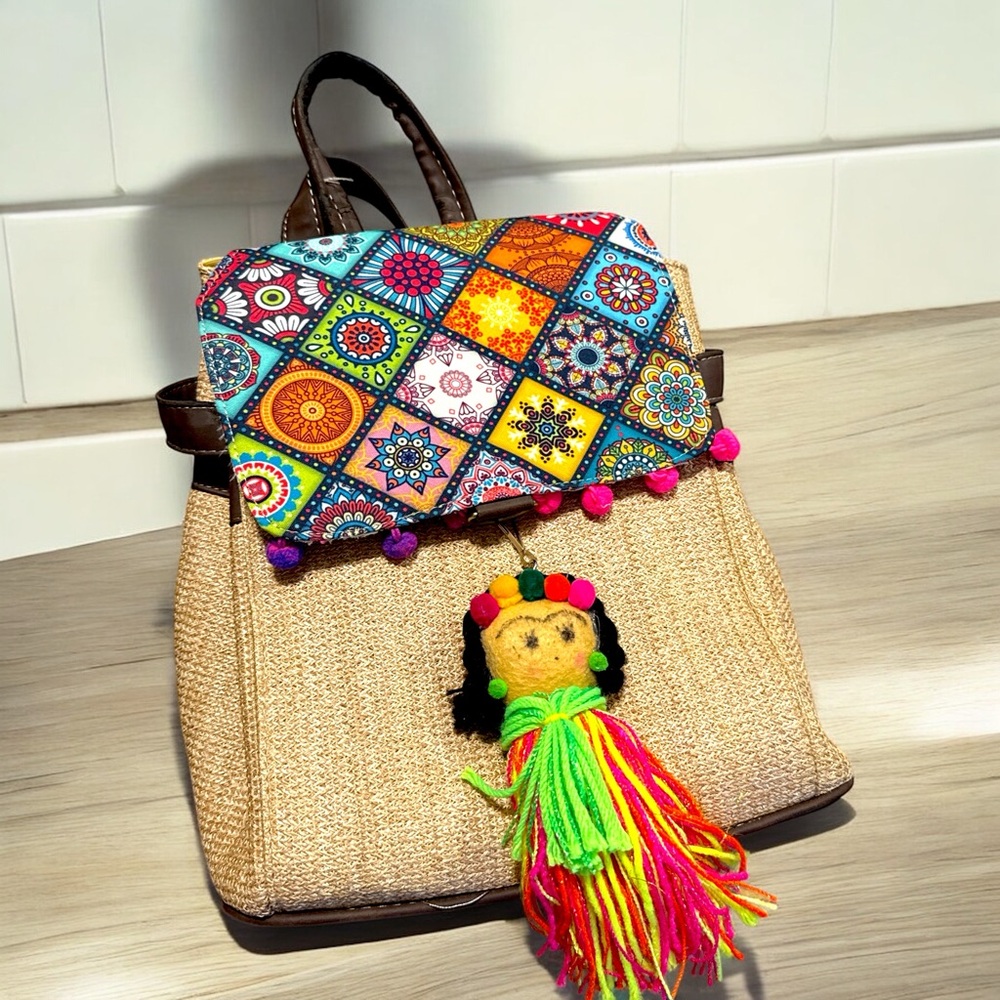 Cream Backpack With Vibrant Patchwork Design - image 1